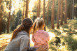 © kieferpix - parent and child mother daughter enjoying time together bonding in nature forest
