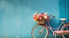 Bicycle With Flowers In A Straw Basket Near The Wall Of A Beautiful House In The Sun Summer Mood.