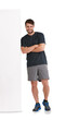 Fitness, man and portrait with arms crossed and wall leaning with smile and workout. Happy, male athlete person and confidence from exercise and training isolated on a transparent, png background
