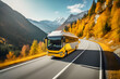 Exterior shot of a travel bus driving along a mountain road in autumn.