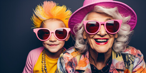 cool old grandmother with hat and grandson, crazy colorful lifestyle concept