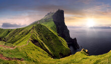 Sunset Over Green Mountain With Atlantic Ocean, Faroe Islands - Kallur Lighthouse