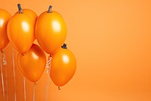 A Colorful Bunch Of Orange Balloons For Halloween Decoration