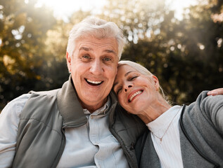 Wall Mural - Happy, portrait and senior couple hug in a forest, love and bond in nature on a weekend trip together. Smile, face and romantic old woman embrace elderly male in woods, cheerful and enjoy retirement