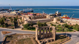 Fototapeta  - Famagusta, Northern Cyprus - Aerial view of Famagusta (Gazimagusa), View on the Famagusta Port from The Old town wall of Famagusta , Palm Beach, Othello castle
