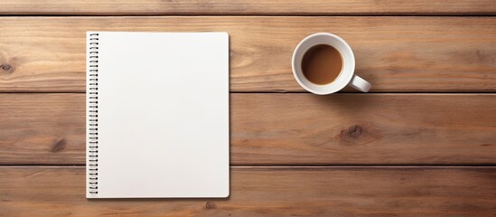 Aufkleber - Notebook seen from above with coffee and light on wooden table