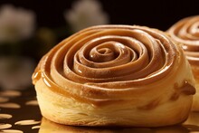 A Close-up Of A Pastry With A Spiral Design And A Floral Accent. Generative AI
