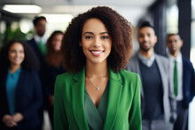 Group Of People Standing In Office, Confident Black Woman Wearing Green Leading Corporate Team With Confidence 