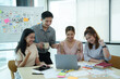 © PaeGAG - Group of asian creative teamwork discuss at business meeting for developing mobile phone app project, ux, ui start up, small business concept