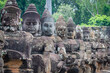 buddha carved stone in angkor wat, cambodia
