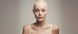 Confident bald woman posing waist up minimal background alopecia and cancer awareness