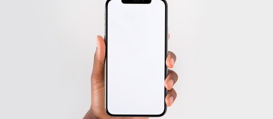 Poster - Women s hands holding cell phone with empty screen isolated
