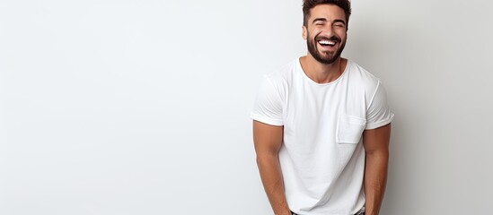 Poster - Smiling male fashion model in trendy white attire isolated on white background with space for text