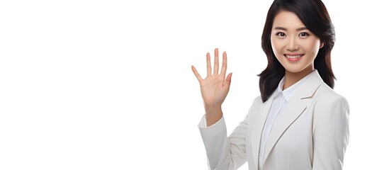 Poster - Asian woman displaying an open hand prompt with room for product on white backdrop
