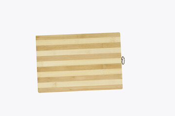 Wall Mural - Top view of wooden chopping board isolated on white background with clipping path