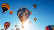 Colorful balloons with a gondola illuminated by the sun. Generative AI technology.
