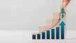 © THAWEERAT - Growth hacking concept with a chart. A modern approach to marketing, combining creativity and technical savvy to rapidly increase business growth, and automation to drive growth.