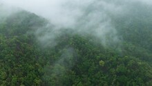4K Hyperlapse Video: Aerial View Morning Scenery Mist Flowing Over The High Mountains The Movement Of Fog Or Cloud, Pang Puai, Mae Moh, Lampang, Thailand