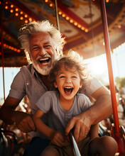 In The Summertime Joy, A Senior Man And His Grandson Relish A Carousel Ride, Embodying Happiness And Togetherness In The Midst Of Fun.