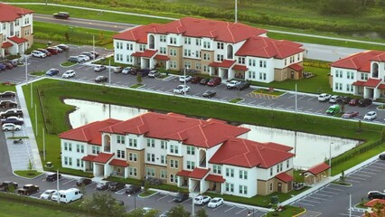 Wall Mural - View from above of apartment residential condos in Florida suburban area. American condominiums as example of real estate development in USA suburbs