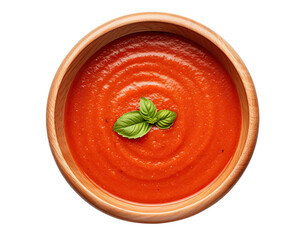 Tomato soup in wooden bowl isolated on transparent background, top view