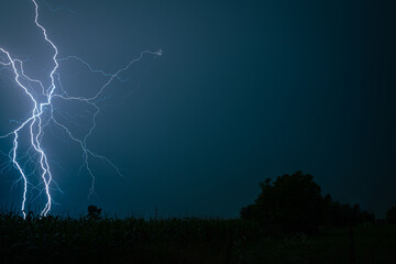 Wall Mural - spectacular blue lightning strike at night