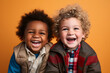 interracial portrait of 2 young boys laughing together
