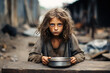 Hungry starving poor little child looking at the camera 