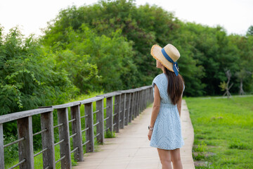 Canvas Print - Woman hiking in the relax trail