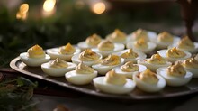 Deviled Eggs On Wooden Board Closeup View 