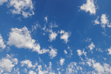 Sticker - Cloudscape. Blue sky and white clouds, wide panorama. Sunny heaven and Earth environment concept. Tranquil relax serene sunshine blue skies cloudy panoramic background