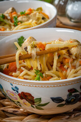 Wall Mural - Fried noodles with chicken and vegetables.