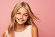 © Tetiana - Generative AI portrait of happy pretty cute young girl isolated on pink color background blond stunning flying hairstyle
