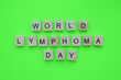 Leinwandbild Motiv September 15, World Lymphoma Awareness Day, minimalistic banner with the inscription in wooden letters