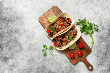 Wall Mural - Mexican tacos with beef. Gray rustic background. Top view, flat lay.