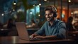 © Collab Media - Portrait of young Indian call center operator man doing his job with a headset