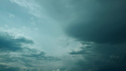 Wall Mural - Cumulonimbus Clouds Moving In Cloudy Dark Sky. 4k Time Lapse Dark Storm Cloudy Rainy Sky With Rain Heavy Clouds. Sky Natural Background. Weather Forecast Concept. Cloudscape. Time Lapse, Timelapse