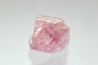 Closeup rare color rough uncut pink diamond crystal 