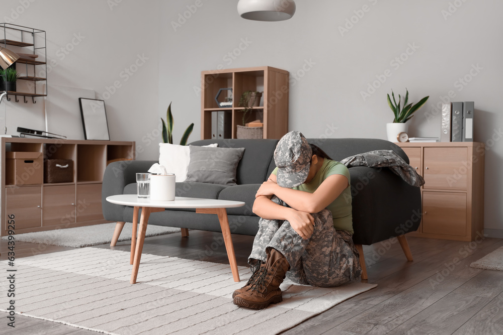 Stressed female soldier at psychologist's in office