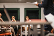 © qunica.com - Two businesspeople watching a presentation