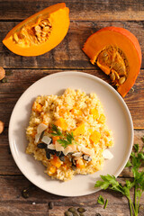 Wall Mural - pumpkin risotto with parmesan, top view