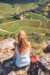 Wall Mural - Woman traveling in France,  Burgundy landscape in Saone et Loire- tour tourism, travel,vacation concept