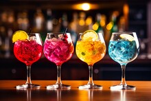 Five Colorful Gin Tonic Cocktails In Wine Glasses On Bar Counter In Pup Or Restaurant | Generative AI