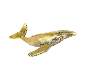 Whale gold colored animal statue on white background