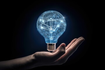machine learning hand on light bulb