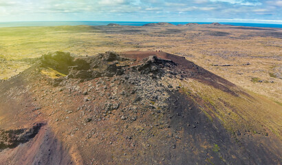 Canvas Print - Saxholl Crater is a famous volcano in Iceland. Aerial view in summer season from drone.