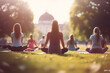 group of people doing yoga_in a park.  