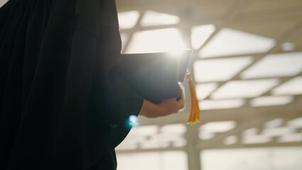 Wall Mural - Graduation Congratulations student ceremony on the day of graduation at the university,Sunset Silhouette orange sky Slow motion 4K