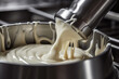 Macro shot of a homogenizer efficiently emulsifying milk and cream for dairy production