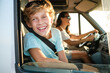 © ADDICTIVE STOCK CORE - Kid with mother having summer trip by car